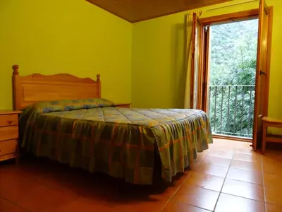 Cama o camas de una habitación en Apartaments La Canal