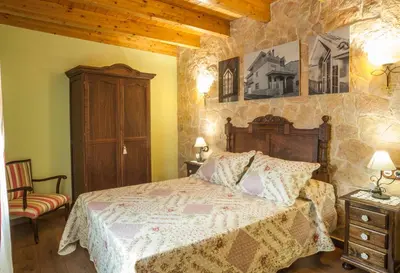 Cama o camas de una habitación en Casa Rural Millán