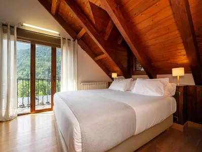 Cama o camas de una habitación en Villa de Plan Apartments&Suites