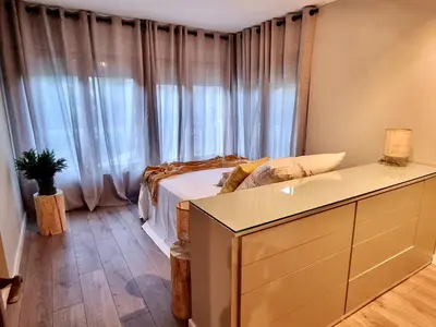 Cama o camas de una habitación en Apartamentos LCR Boutique, LCR Suites y LCR Los Valles