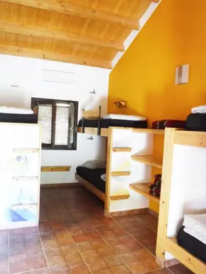 Cama o camas de una habitación en Tantaka - Albergue Los Meleses