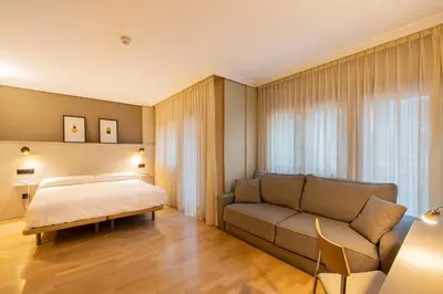 Cama o camas de una habitación en Hotel Santamaria