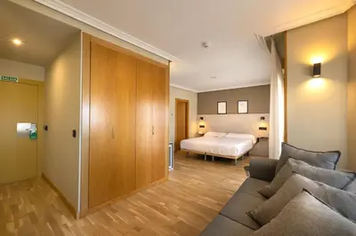 Cama o camas de una habitación en Hotel Santamaria