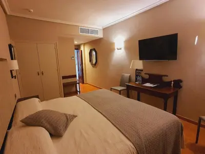 Cama o camas de una habitación en HOSTAL DOÑA JUANA