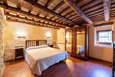 Cama o camas de una habitación en Casa Rural Moixella