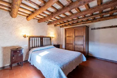 Cama o camas de una habitación en Casa Rural Moixella