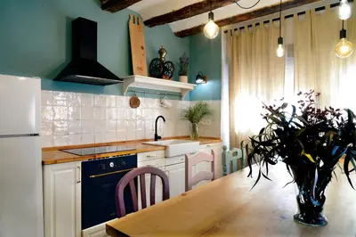 Una cocina o zona de cocina en PERIQUiNA CASA RURAL CON ENCANTO