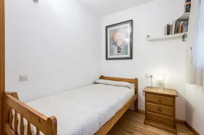 Cama o camas de una habitación en Apartamento La Benasquita