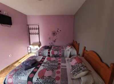 Cama o camas de una habitación en Hostal El Bodegon