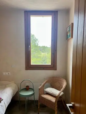 Cama o camas de una habitación en B&B Masia Katmandú