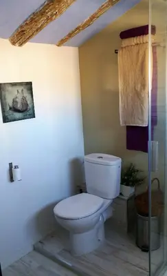 Un baño de 18 Torres