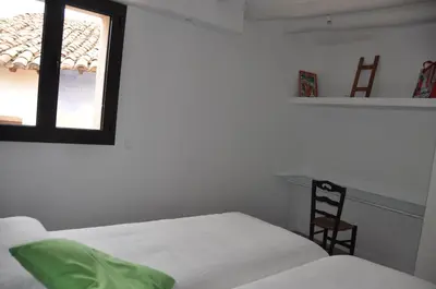 Cama o camas de una habitación en Apartamentos Las Moradas