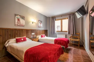 Cama o camas de una habitación en Hotel SNÖ Beret