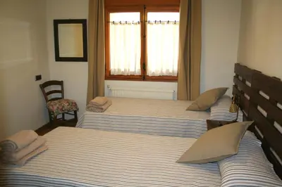 Cama o camas de una habitación en Apartament Ca l'Emilia