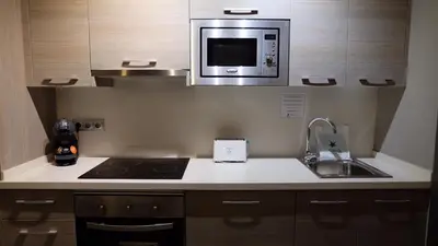 Una cocina o zona de cocina en Apartamentos Real Lleida