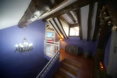 Cama o camas de una habitación en El Capricho de Nieves