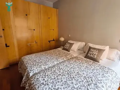 Cama o camas de una habitación en Dos Torres Retiro Urbano en Alfonso I