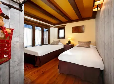 Cama o camas de una habitación en Apartamento Amets de Aran
