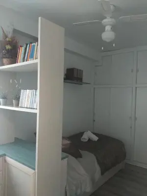 Cama o camas de una habitación en Ático con terraza en la Jota