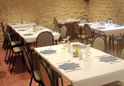 Un restaurante o sitio para comer en Racó dels Torrats