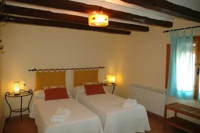 Cama o camas de una habitación en Casa con piscina y vistas a montaña - Cal Solsona