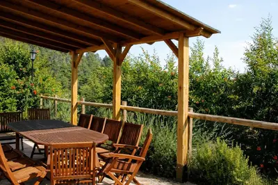 Un balcón o terraza de Casa con piscina y vistas a montaña - Cal Solsona