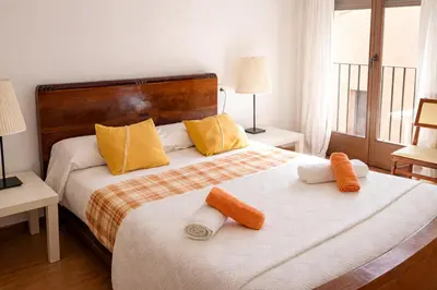 Cama o camas de una habitación en Casa amb llar de foc - Casa Anina
