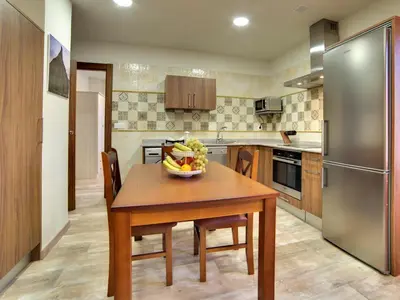 Una cocina o zona de cocina en Apartamentos La Jasa