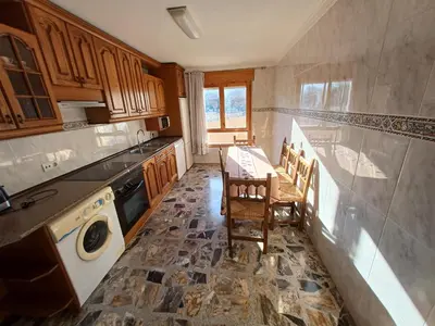Una cocina o zona de cocina en Casa Rural Apartamentos Sol ideal para familias .