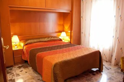 Cama o camas de una habitación en Casa Rural Apartamentos Sol ideal para familias .