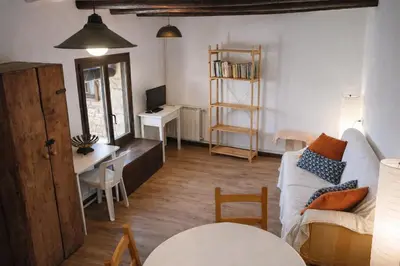 Cama o camas de una habitación en Cal Xeco de Montsonís, dóna la benvinguda a la teva mascota