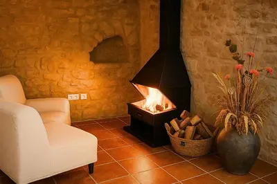 Zona de estar de Casa amb llar de foc i vistes a la vall - Cal Valeriet