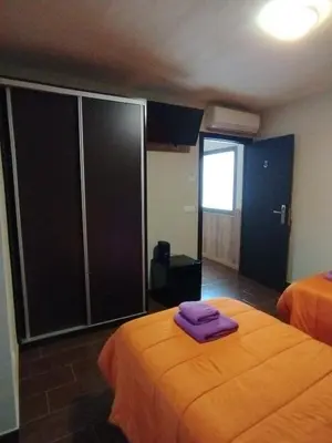 Cama o camas de una habitación en Pensión Matarraña