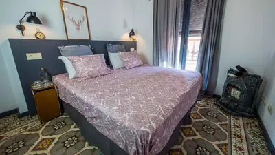 Cama o camas de una habitación en Groc Rooms