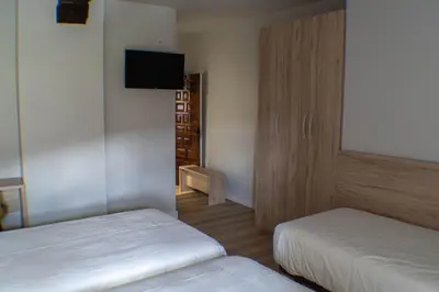 Cama o camas de una habitación en Posada de Roncesvalles