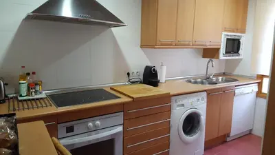 Una cocina o zona de cocina en Apartamentos Alcañiz, Gala