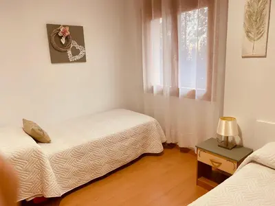 Cama o camas de una habitación en Apartamentos Alcañiz, Gala