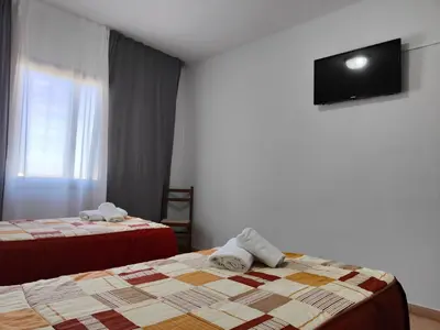 Cama o camas de una habitación en Hostal Restaurante Venta del Barro