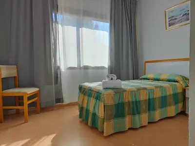 Cama o camas de una habitación en Hostal Restaurante Venta del Barro