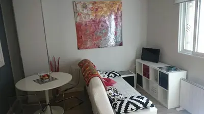 Una televisión o centro de entretenimiento en Apartamento Cigüeña