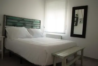 Cama o camas de una habitación en Hostal Gargal