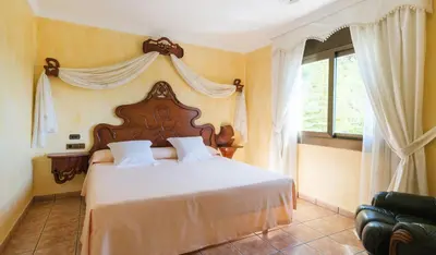 Cama o camas de una habitación en Hotel Restaurant Cal Petit