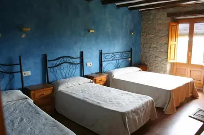 Cama o camas de una habitación en Ca l'Antic Joanet