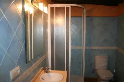 Un baño de Ca l'Antic Joanet