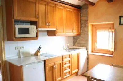 Una cocina o zona de cocina en Ca l'Antic Joanet