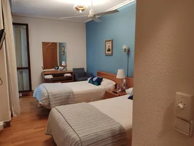 Cama o camas de una habitación en Pension Payvi