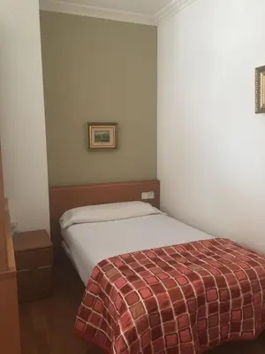 Cama o camas de una habitación en Pension Payvi