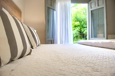 Cama o camas de una habitación en La Casa Gris
