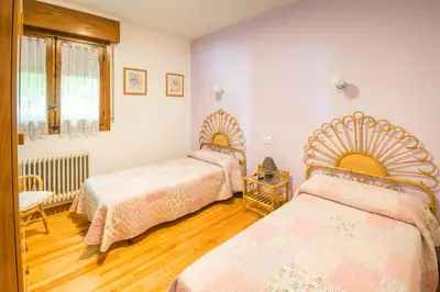 Cama o camas de una habitación en Acogedora casa rural a los pies de la Selva Irati