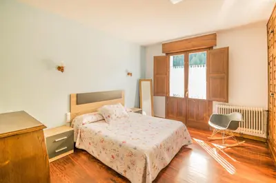 Cama o camas de una habitación en Acogedora casa rural a los pies de la Selva Irati